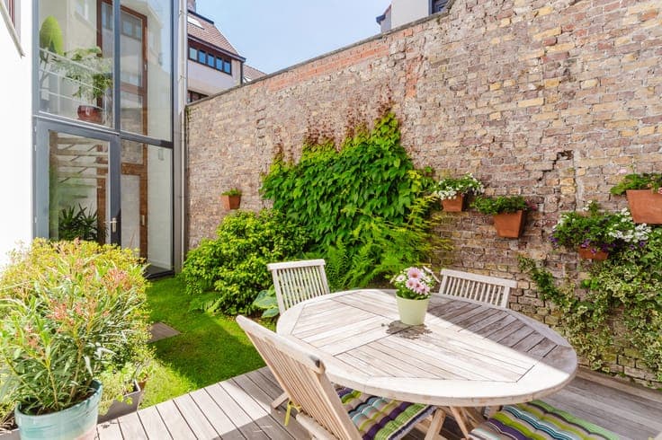 Architectenwoning met binnentuin,dakterras en garage te Gent