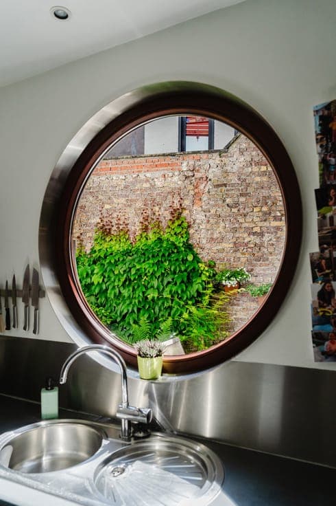 Architectenwoning met binnentuin,dakterras en garage te Gent