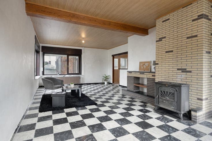 Gezinswoning met potentieel en 4 slaapkamers nabij het centr
