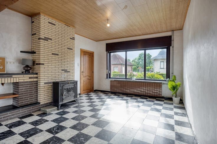 Gezinswoning met potentieel en 4 slaapkamers nabij het centr
