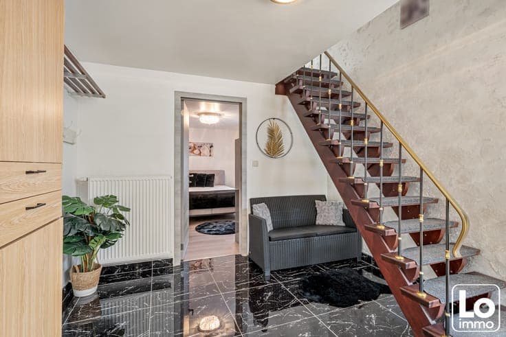 Instap klare half open woning met inpandige garage en kle...