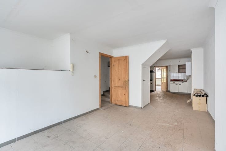 Te renoveren handelshuis op een toplocatie te Sint-Truiden