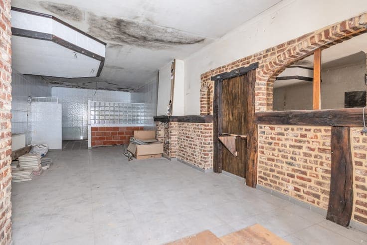 Te renoveren handelshuis op een toplocatie te Sint-Truiden