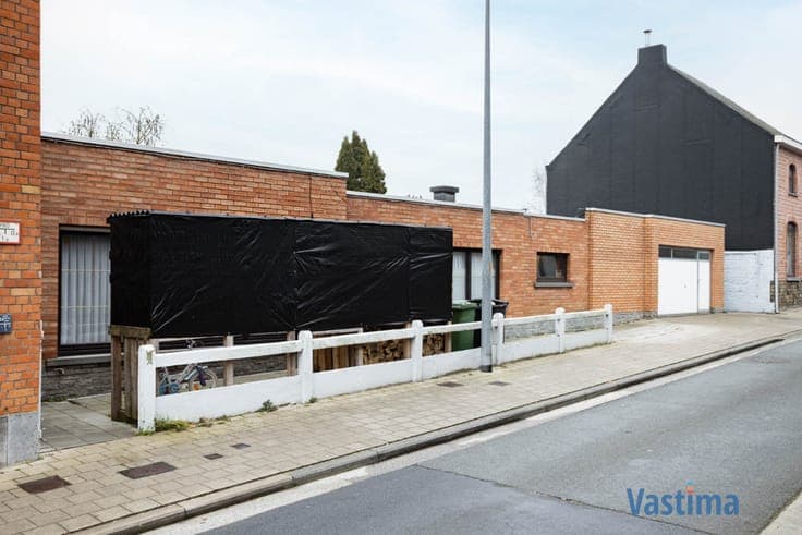 Uniek pand bestaande uit 2 woongelegenheden, garage en bu...