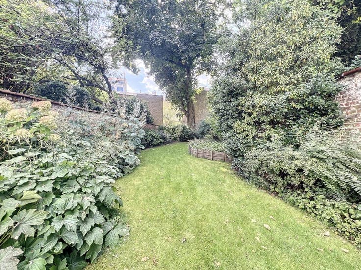 Mansion with garden and garage