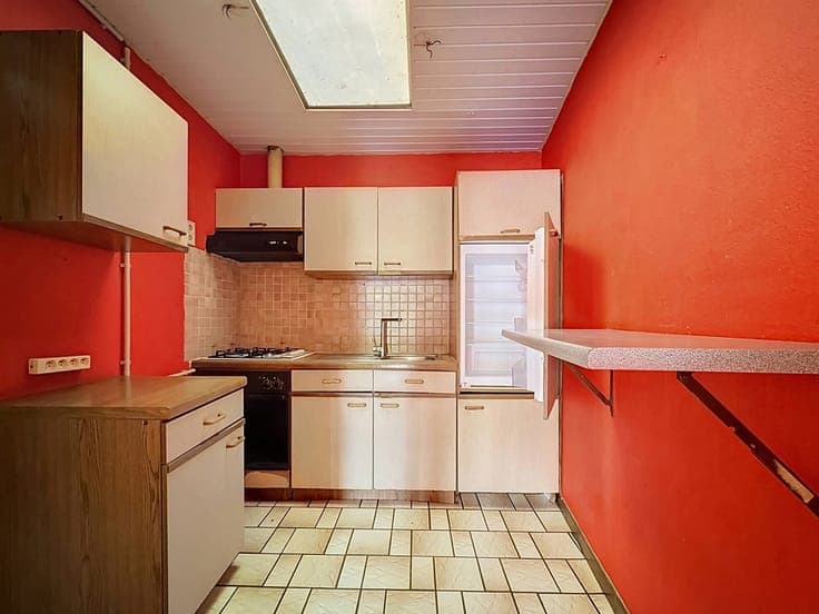 Maison unifamiliale divisée en deux logements