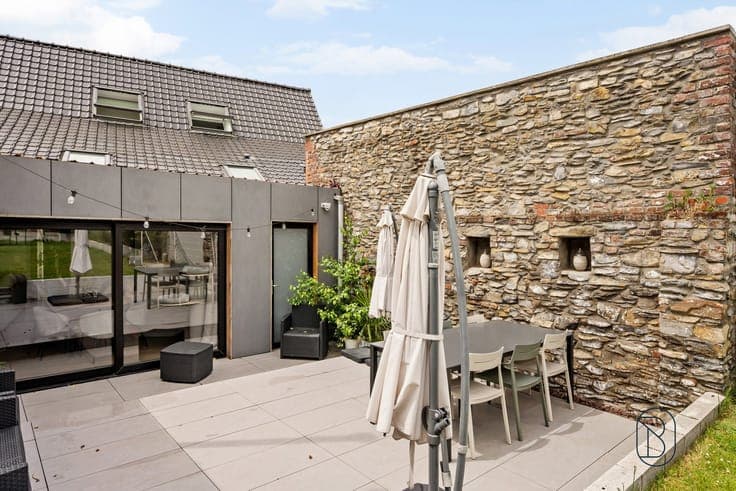 Renovated home with garden and solar panels
