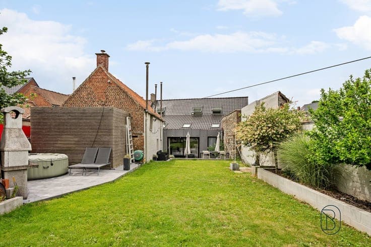Renovated home with garden and solar panels