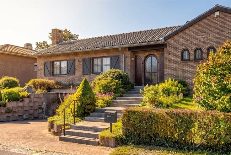 In Embourg, a spacious bungalow with garages and a garden.
