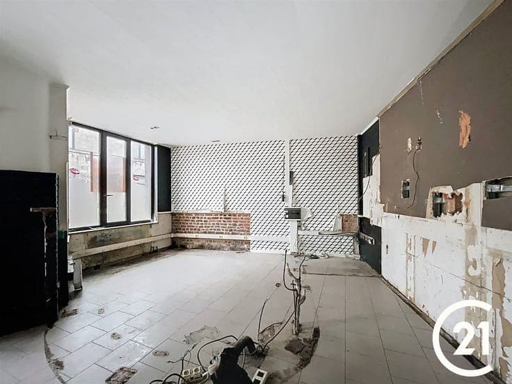A deux pas du centre-ville: immeuble mixte (avec revenus loc