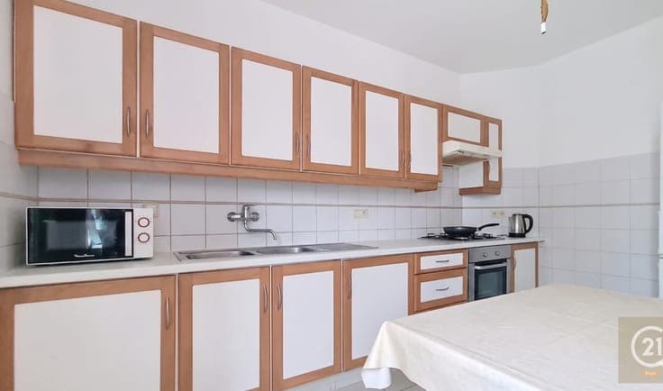 Income property with potential and converted attic level