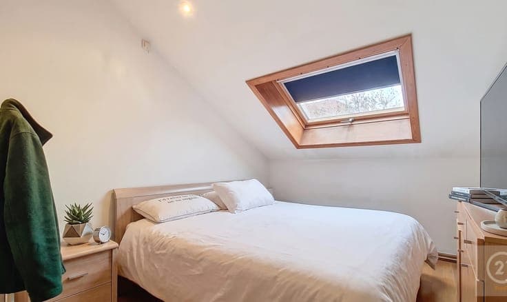 Income property with potential and converted attic level