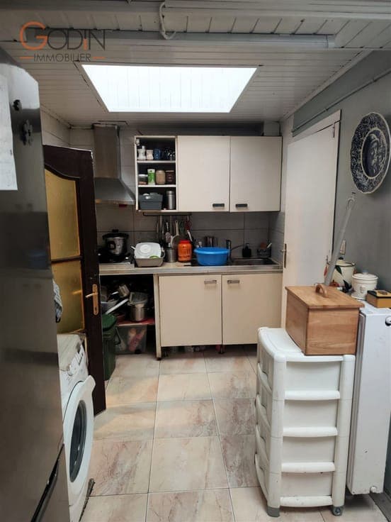 Maison mitoyenne avec terrasse et grenier aménageable