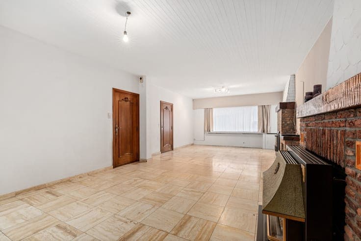Halfopen woning met tuin en 3 slaapkamers