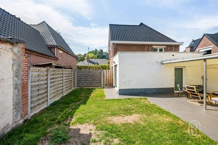 Charming renovated home with a garage and garden