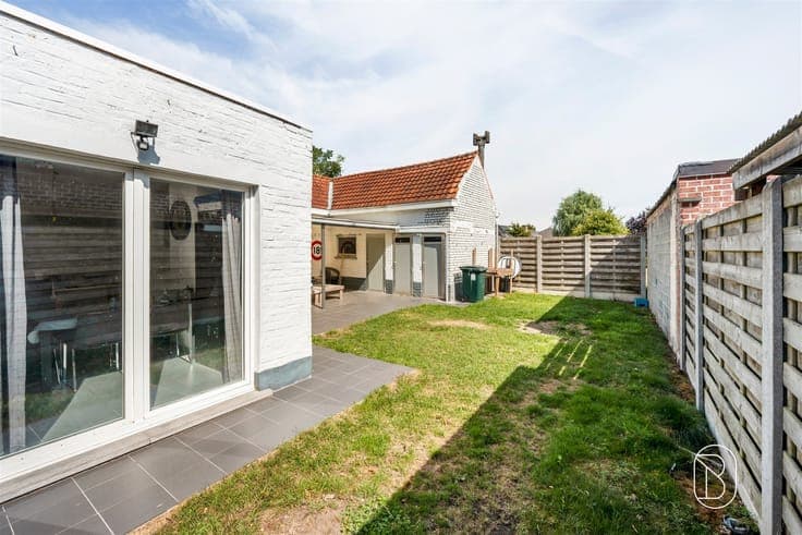 Charming renovated home with a garage and garden