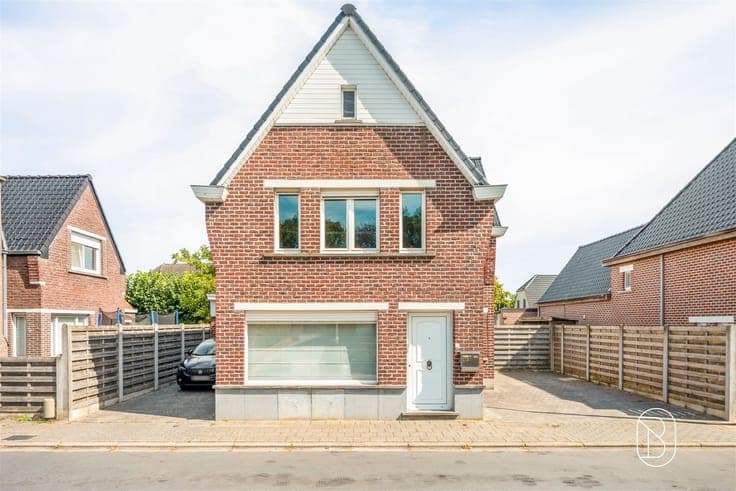 Charming renovated home with a garage and garden