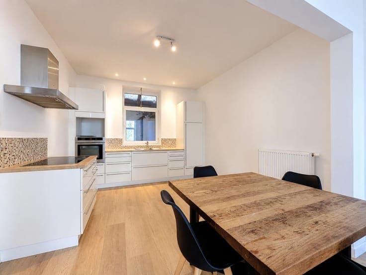 Renovated Four-Bedroom Home with Dual Potential