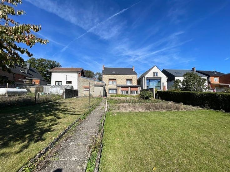 House in need of renovation with a new roof