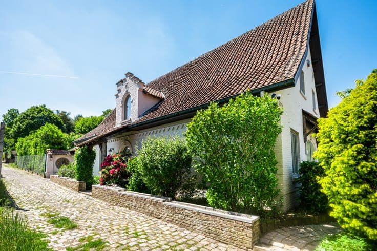 Rural residence with poolhouse and garage for sale in Putte