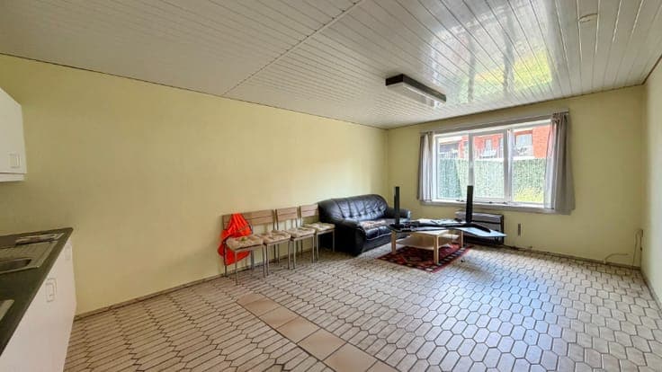 Opbrengsteigendom met 7 appartementen + ruime garage-maga...