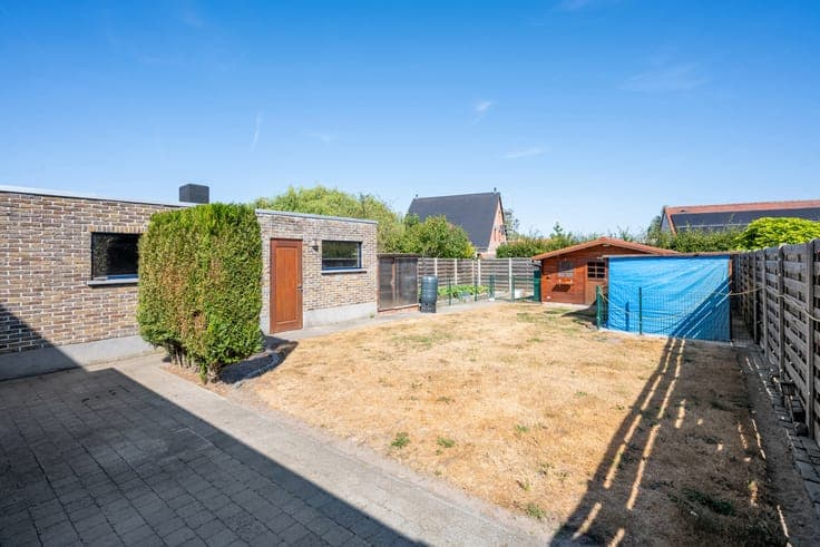 House with renovated roof, garage and garden
