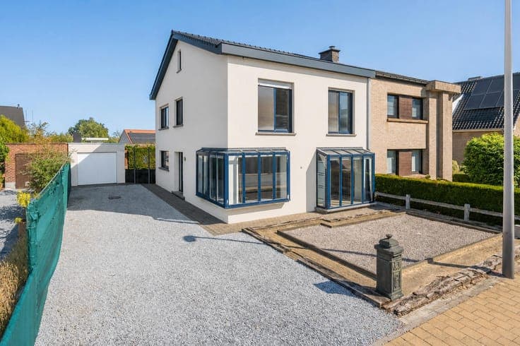 House with renovated roof, garage and garden
