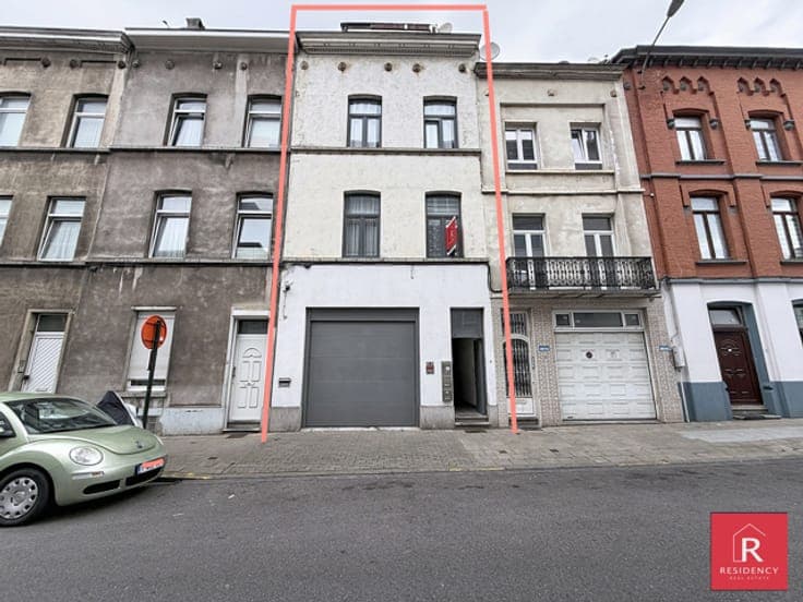 Investment Building with Garage & 3 Units
