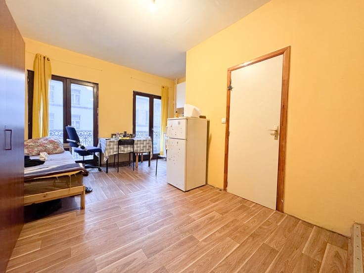 INVESTMENT PROPERTY WITH 9 APARTMENTS – STRONG RENTAL POTENT