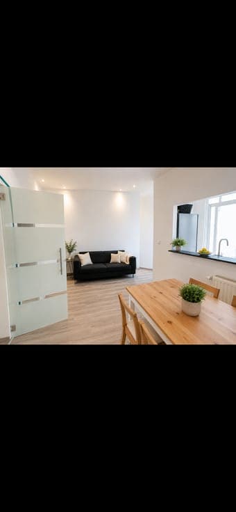 Licensed income property with 4 apartments + rear building