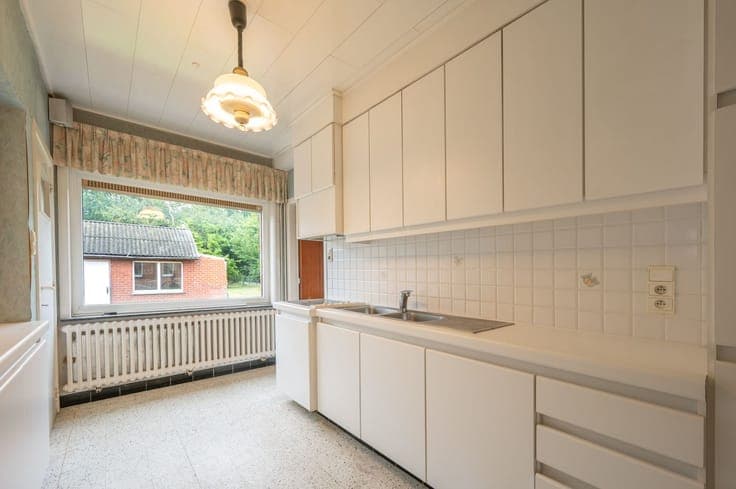 Te renoveren woning op ruim perceel te Hertsberge