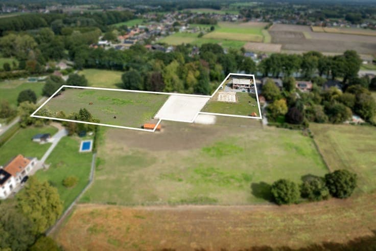 Rural property with outdoor arena and pasture on approximat