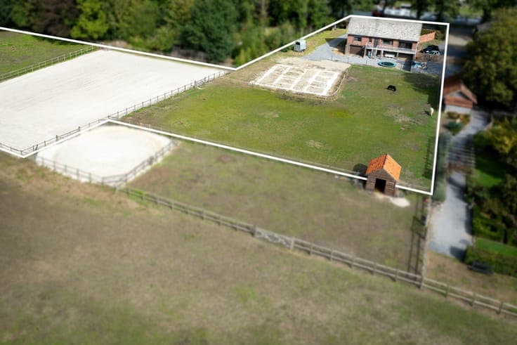 Rural property with outdoor arena and pasture on approximat