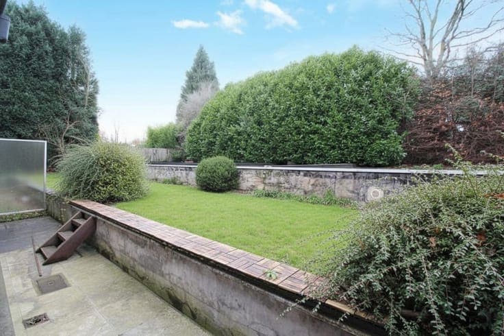 Property comprising a flat, ground-floor commercial premises