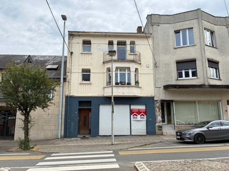Mixed-use building with 2 apartments in Virton.