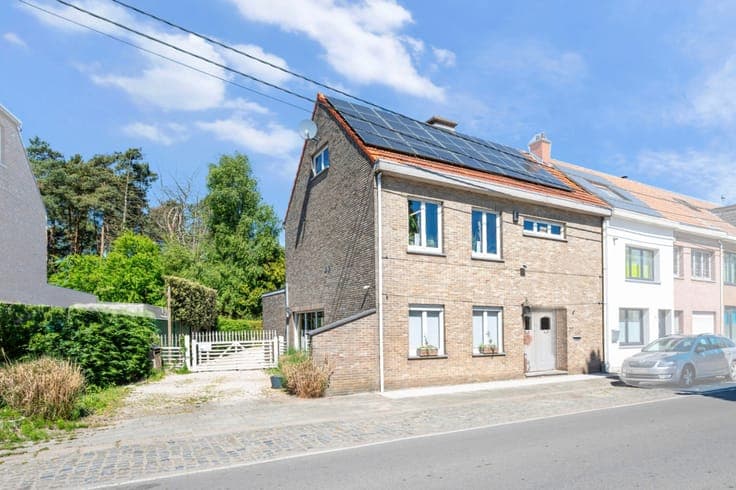 Energiezuinige woning met magazijn en grote tuin!