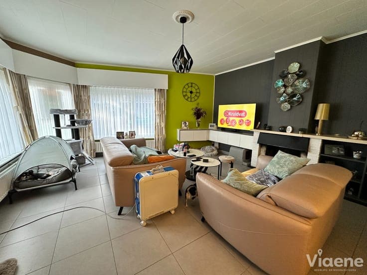 Opbrengsteigendom met 2 appartementen én 2 garages