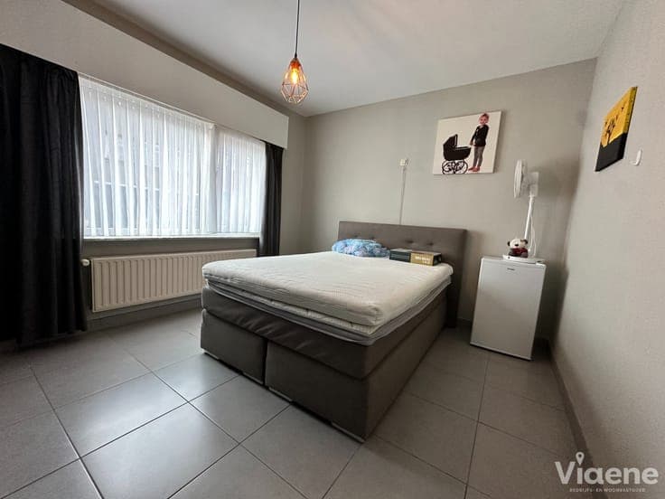 Opbrengsteigendom met 2 appartementen én 2 garages