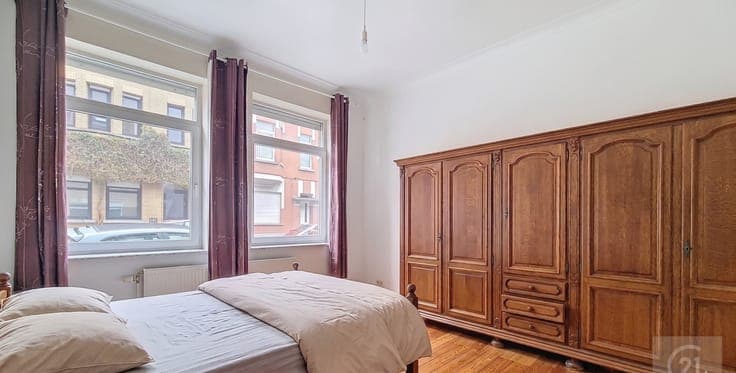 Income property with potential and converted attic level
