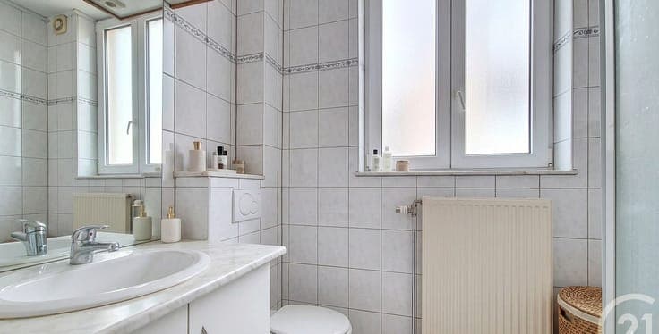 Income property with potential and converted attic level