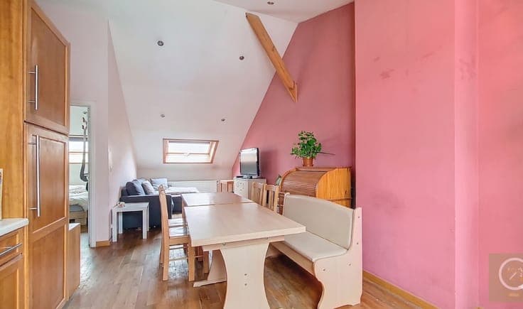 Income property with potential and converted attic level