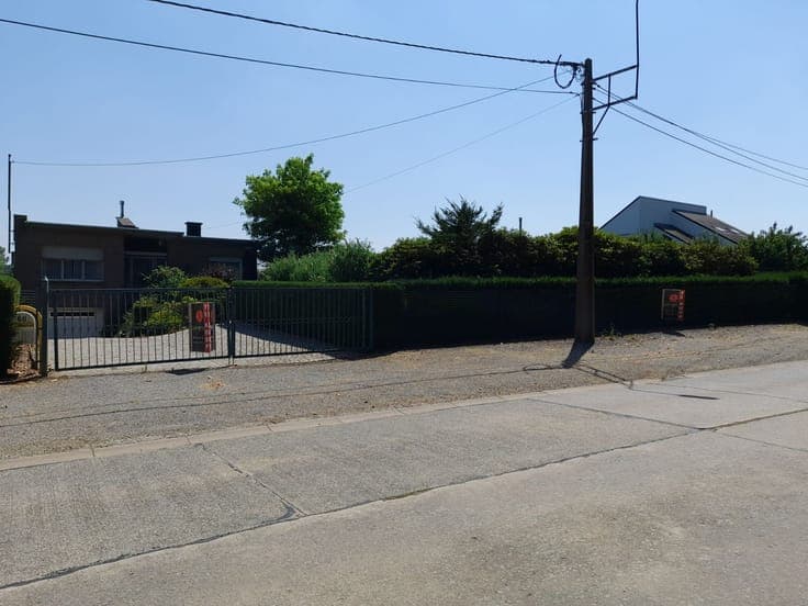 Woning + bouwgrond voor open bebouwing