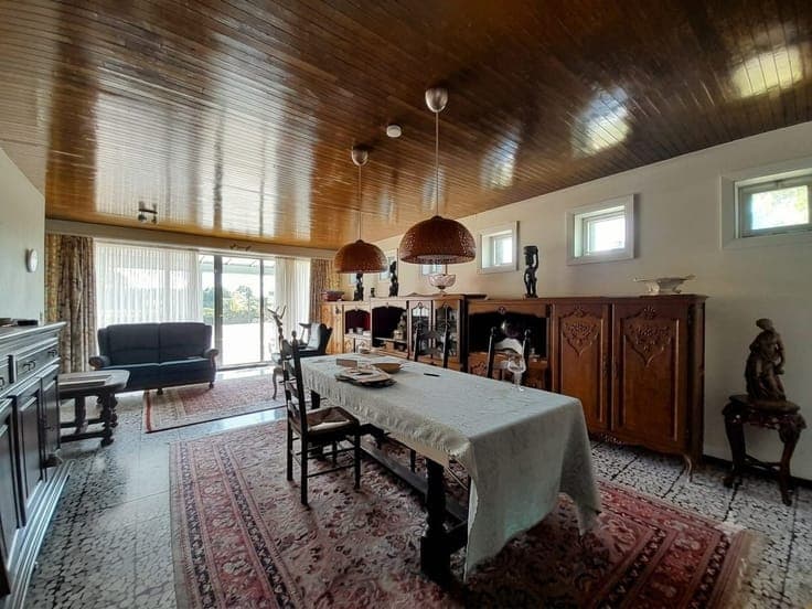 Woning + bouwgrond voor open bebouwing