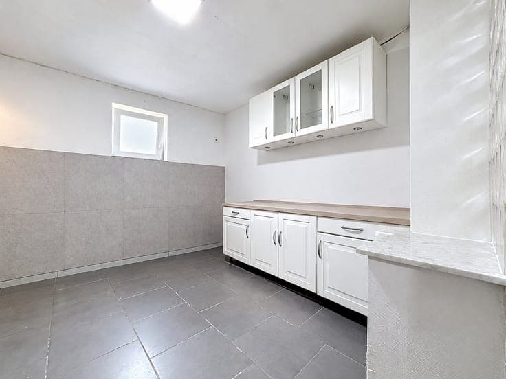 MAISON DE COMMERCE - RDC COMMERCIAL ET APPARTEMENT 1ER