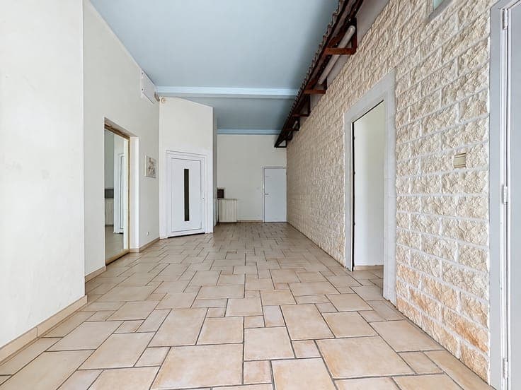 MAISON DE COMMERCE - RDC COMMERCIAL ET APPARTEMENT 1ER