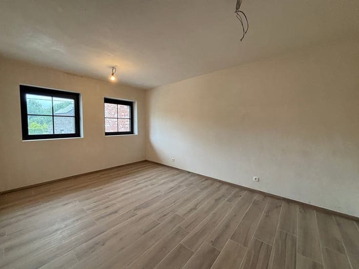NEW CONSTRUCTION HOME WITH 4 BEDROOMS, A GARAGE, AND A GARDE