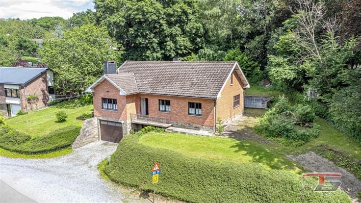 Villa de plain-pied dans un quartier résidentiel proche du c