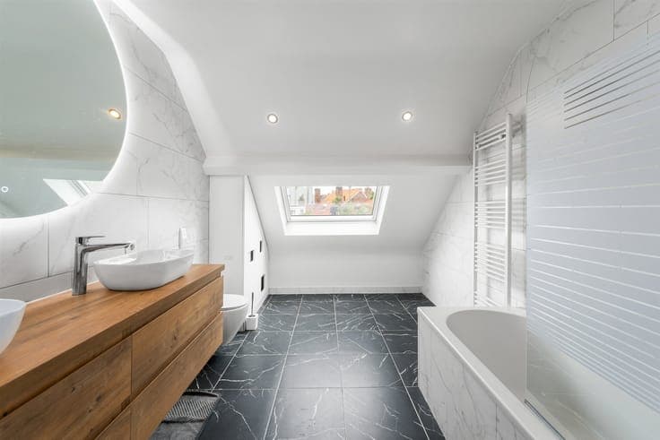 Fully renovated home with 3 bedrooms, 2 bathrooms, and a sun