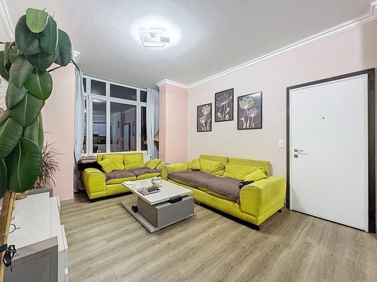 INCOME PROPERTY WITH COMMERCIAL SPACE - 2 AND 1 BEDROOM APAR