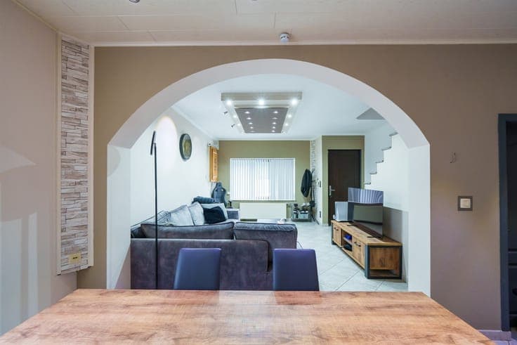 Stunning three-sided house with a garage and garden